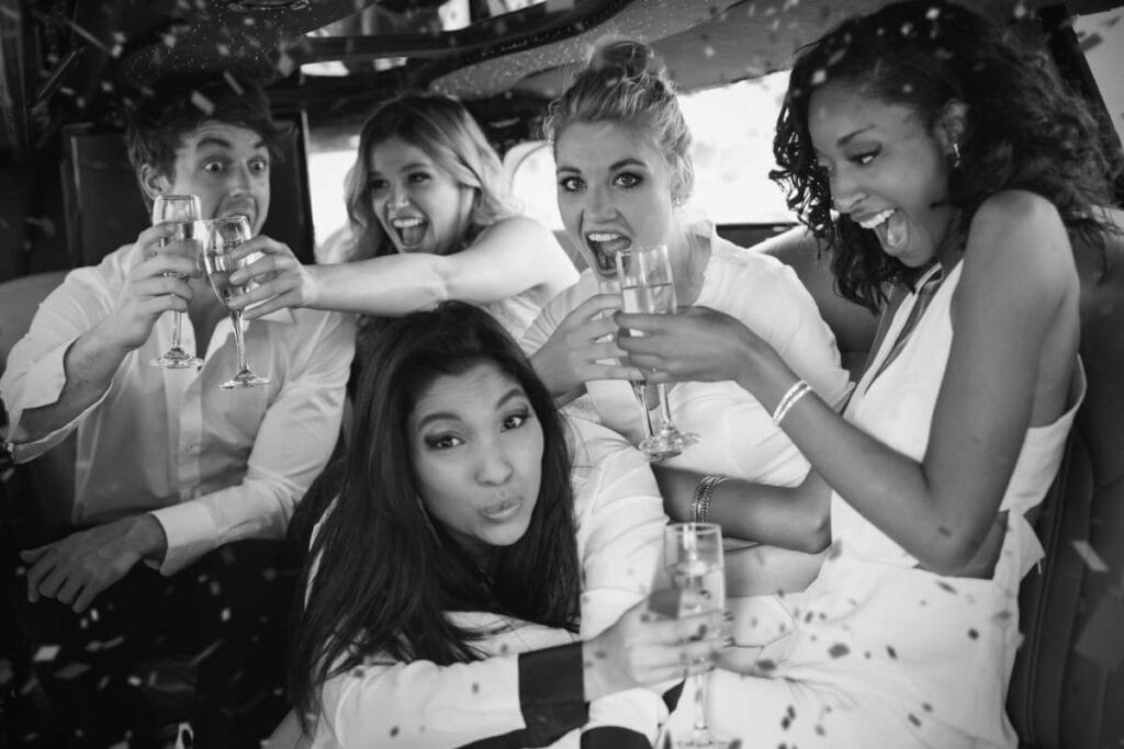 composite image happy friends drinking champagne